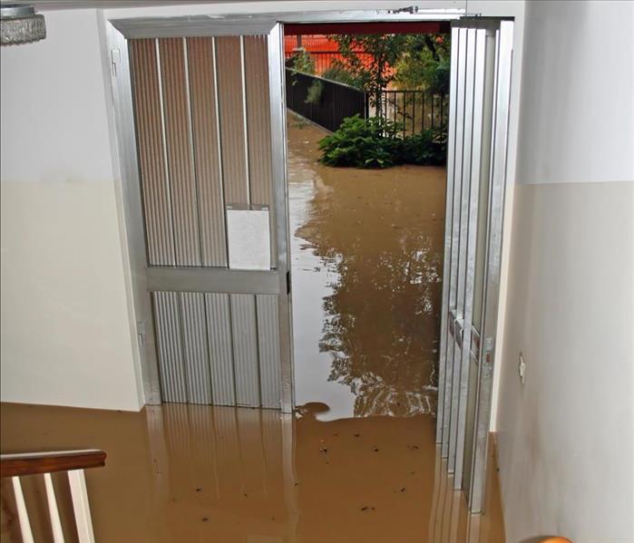 Flood waters in the entrance of a home